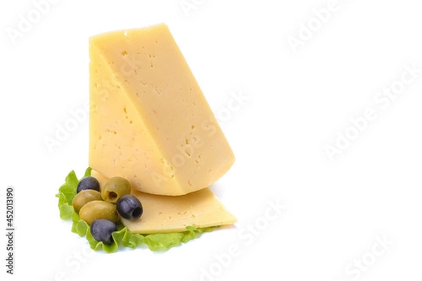 Fototapeta Solid yellow gouda cheese, close-up, isolated on a white background.selective focus.