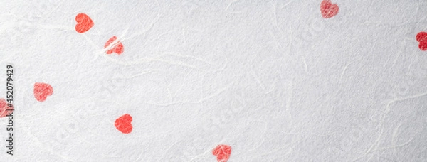 Fototapeta ハート型の紙を織り込んだ手漉き和紙の背景テクスチャー