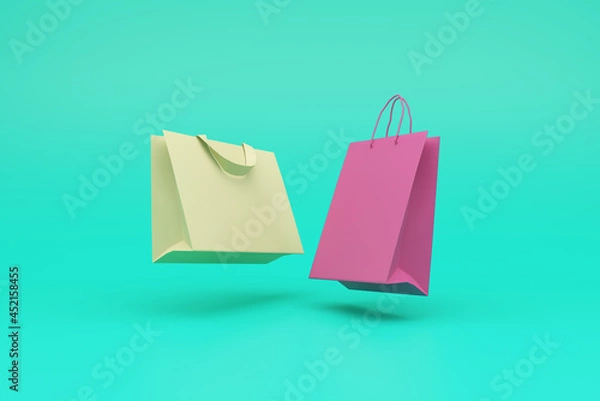 Fototapeta 3D neon paper bags on blue background. Online shopping concept. 3d rendering