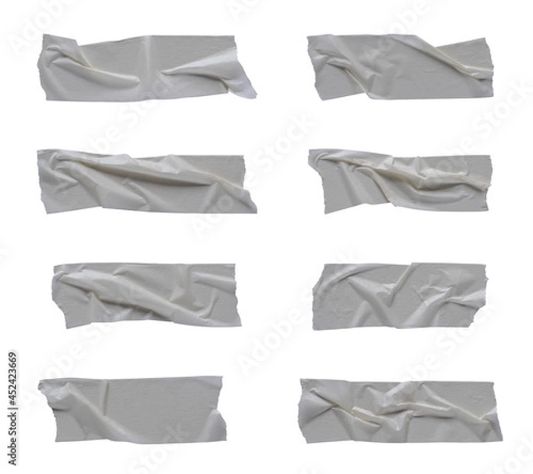 Fototapeta White wrinkled adhesive tape isolated on white background. White Sticky scotch tape of different sizes.	