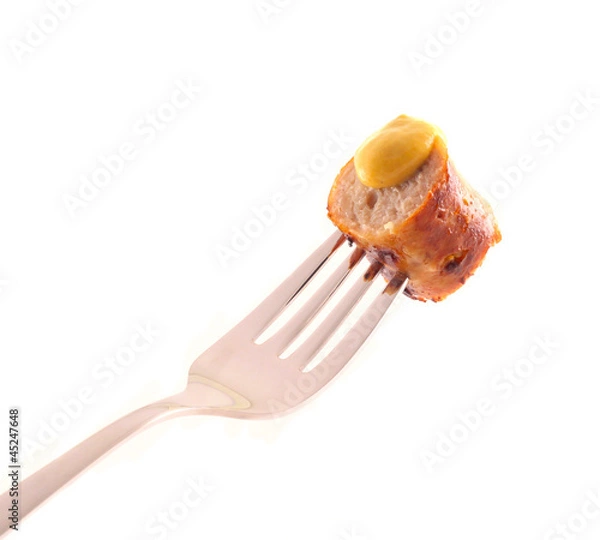 Obraz Bratwurst mit Senf auf einer Gabel
