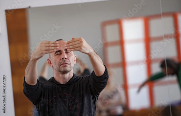 Fototapeta solo dancer move in contemporary improvisation performance