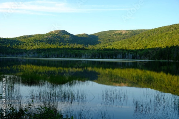 Fototapeta Mountains at sunset reflected in Echo Lake at sundown