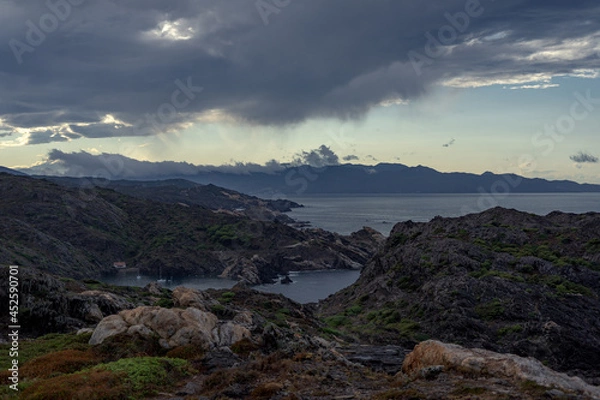 Fototapeta Horizontal view of Creus Cape coast in a cloudy day