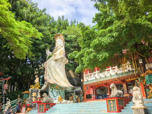 Fototapeta Kwan Yin (Guan Yin) Shrine in Tin Hau Temple Colorful God statues are located at the Repulse Bay is a quaint Taoist temple which is popular for its colorful mosaic statues