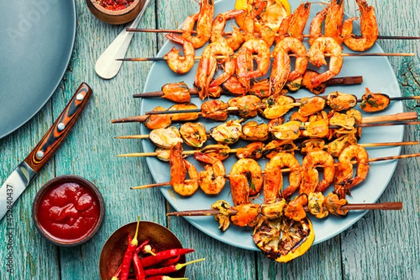 Fototapeta Grilled shrimp on a skewer