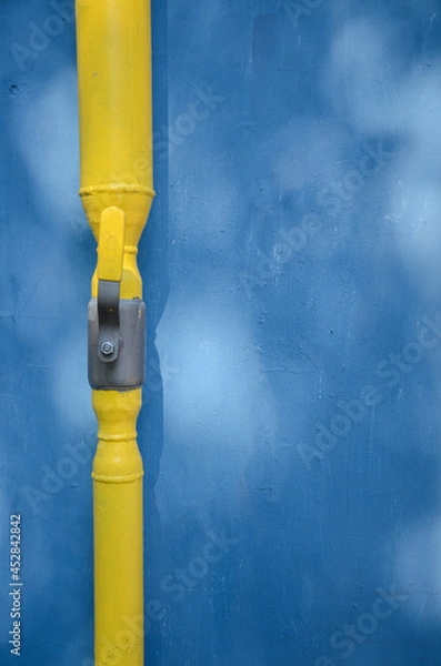 Obraz gas pipe with faucet on wall background