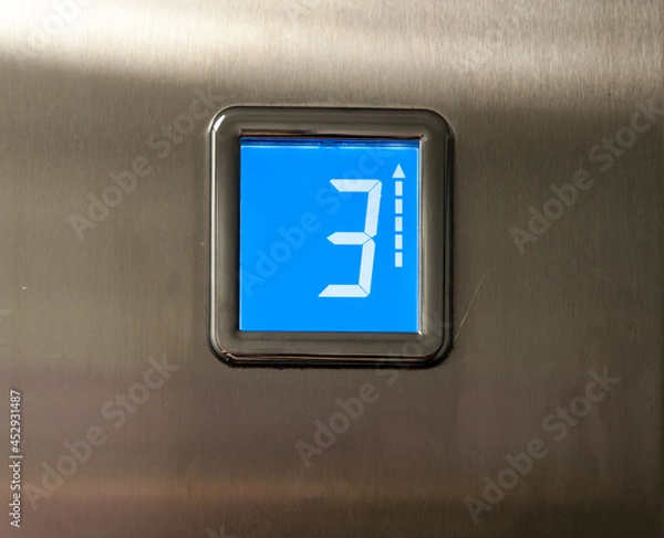 Fototapeta The elevator goes to the third floor