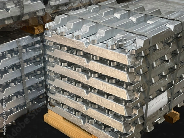Obraz aluminum ingots stacked on a pallet, raw material, aluminum alloy ready to be processed