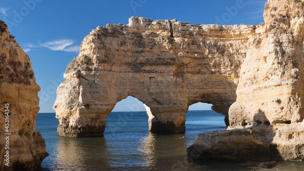 Fototapeta Panoramic view, Ponta da Piedade with seagulls flying over rocks near Lagos in Algarve, Portugal. Cliff rocks, sea and beaches, Algarve region, Portugal. Amazing landscape during summer season.