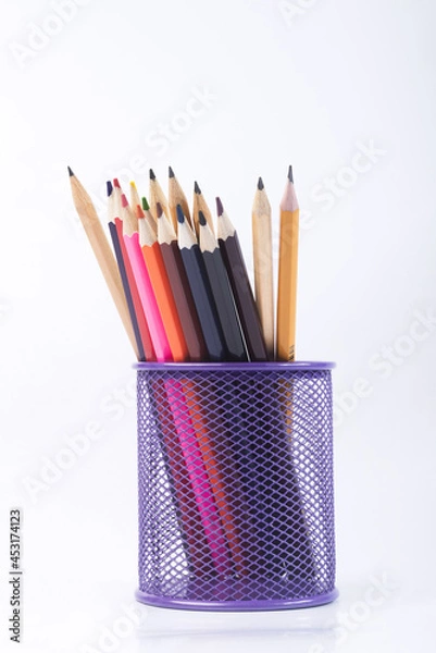 Fototapeta Colored pencils for drawing. Colored pencils on a white isolated background. 