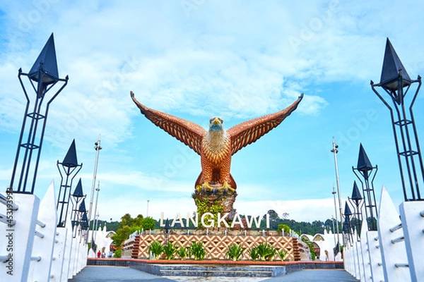 Obraz A sculpture of a red eagle spreading its wings. Popular tourist spot on Langkawi island