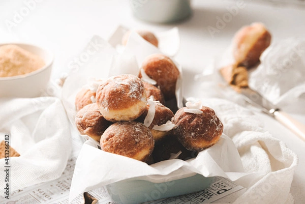 Obraz Mini donuts with powder sugar and coconut