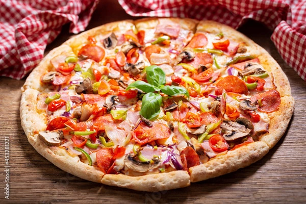 Fototapeta pizza with bacon, mushrooms, salami and vegetables