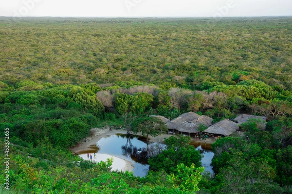 Obraz Indigenous tribe in the middle of the Amazon rainforest, in Brazil. panoramic
