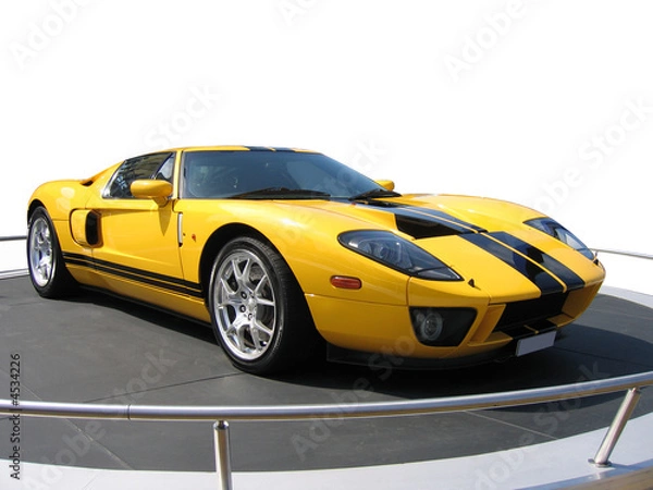 Fototapeta Żółty super samochód na stoisku wystawowym