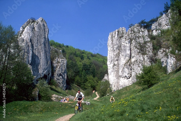 Obraz Cyclists, rocks