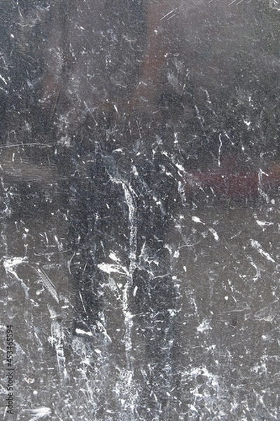 Fototapeta Abstract textured wall background with scratches and paint splotches