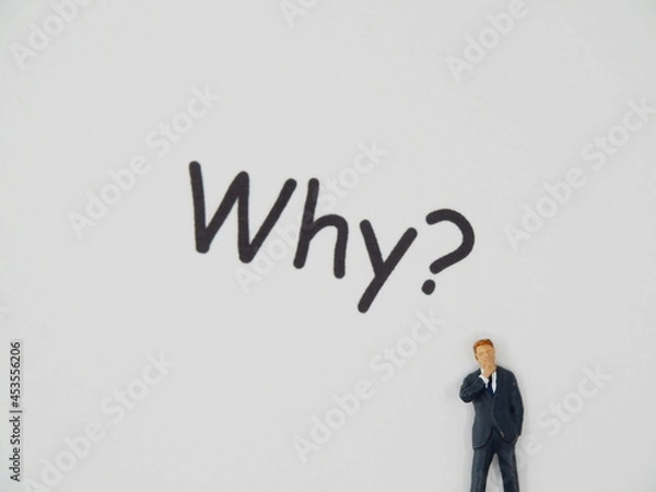 Fototapeta 何故？なぜ？どうして？疑問に思うビジネスマン