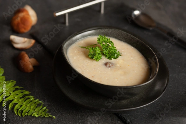 Fototapeta Cream soup from fresh forest mushrooms cep, boletus. Top view, close-up