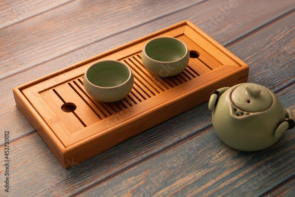 Fototapeta tea set on bamboo
