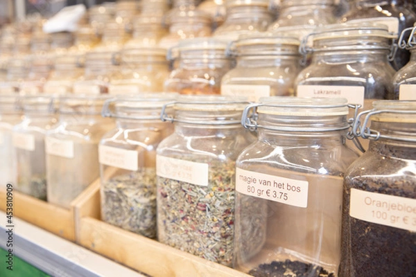 Fototapeta Assortiment of different types of tea in jars in a store in the Netherlands