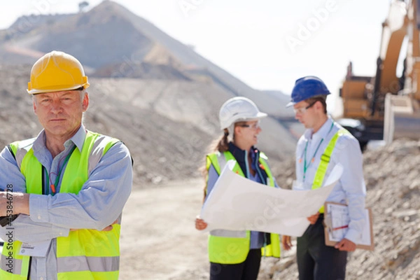 Obraz Business people talking on site