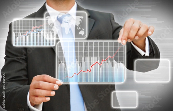 Fototapeta Businessman creating graphic chart