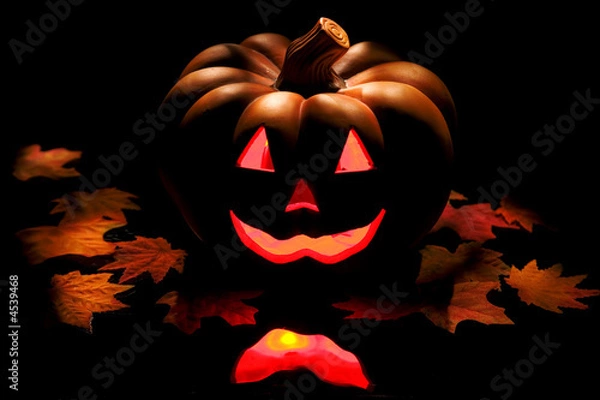 Obraz Halloween pumpkin on black.