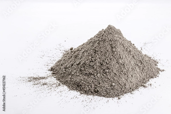 Fototapeta Cement dust pile on isolated white background, construction material.