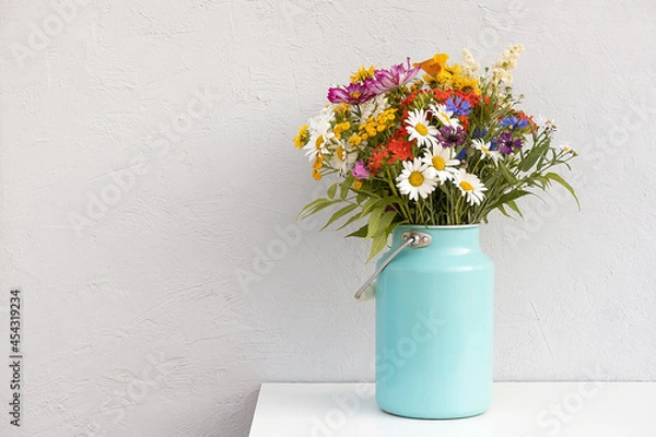 Obraz Bouquet of bright flowers in tin can vase on background grey stone wall. Template for postcard. Concept Women's day, Mothers Day, Hello summer or Hello spring