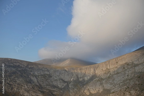 Fototapeta mountains in the clouds