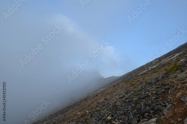 Fototapeta fog over the mountain
