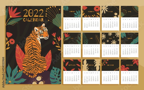 Fototapeta 2022 year calendar concept with  hand drawn illustrations of tiger and jungle leaves.