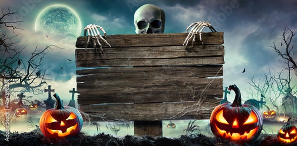 Obraz Halloween Card Party - Pumpkins and Zombies in Graveyard z drewnianą deską