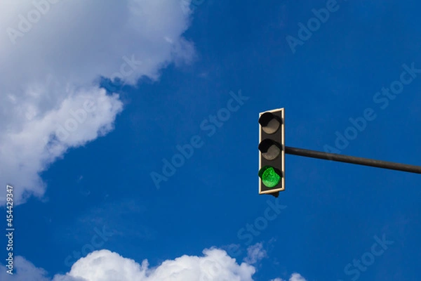 Fototapeta Traffic light with green light on