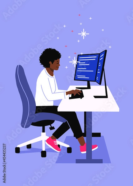 Obraz Software engineering sitting by computer.  two monitors on desk.  female software developer coding in front of screen.  computer science programmer typing.  work from home remote tech.