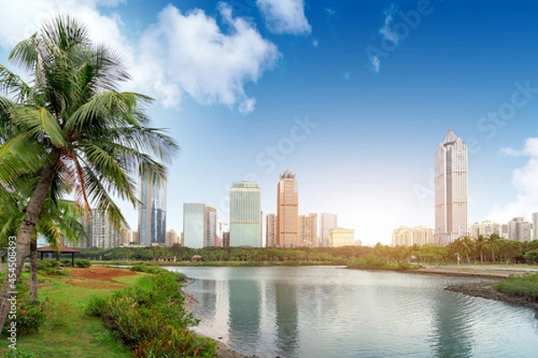 Fototapeta China Haikou Cityscape, high-rise by the lake.
