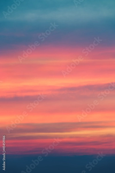 Obraz Colorful cloudy sky at sunrise - sunset. Cloudscape texture. Beautiful abstract texture in bright colors.