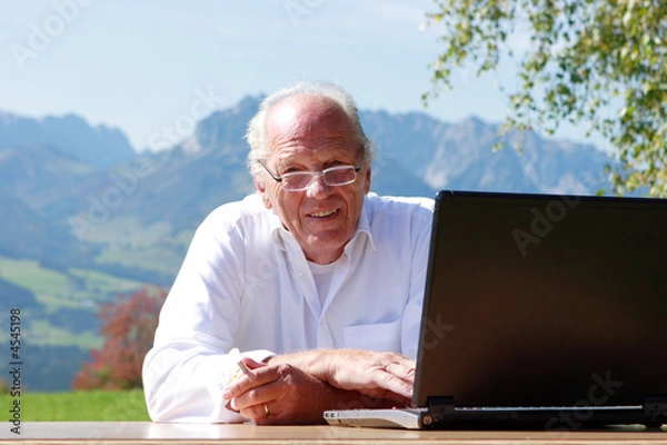 Obraz Senior Manager at work outdoor