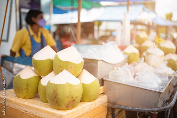 Obraz coconuts for sale market seaside island.