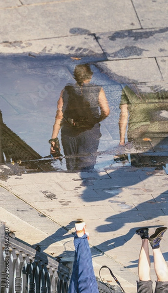 Obraz Man reflection in the pudle