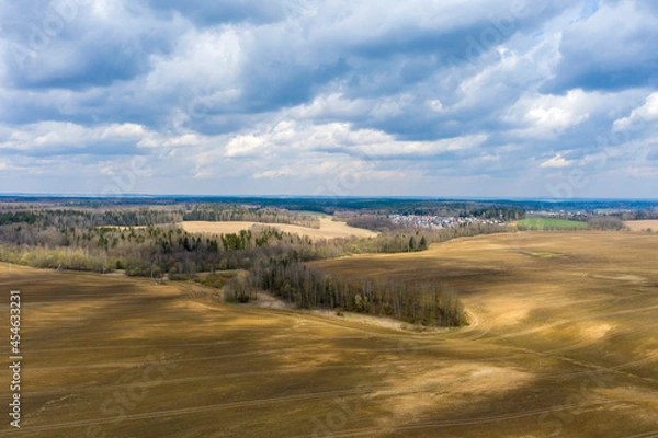 Fototapeta Aerial view of agricultural landscape with fields in spring season.