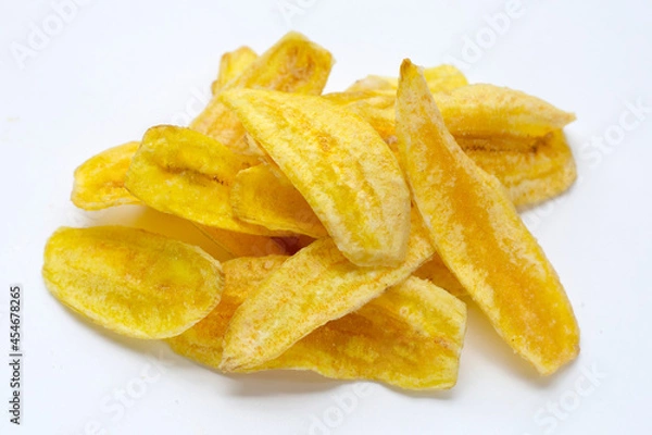 Fototapeta Banana slice chips on white background
