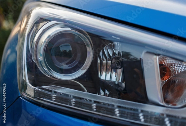 Fototapeta Lighting devices of a passenger car in close-up. fuzzy focus