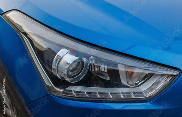 Fototapeta Lighting devices of a passenger car in close-up. fuzzy focus