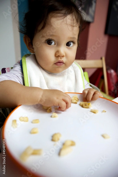 Obraz Bimba che mangia