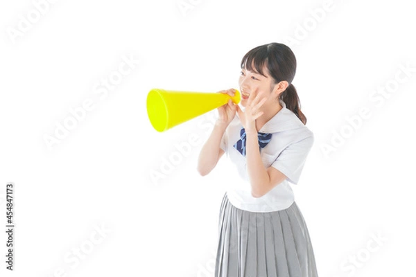 Fototapeta スポーツの応援をする若い女性