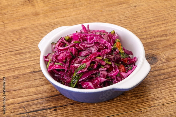Fototapeta Pickled red cabbage with herbs