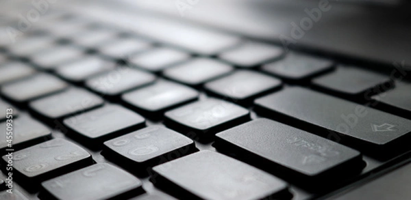 Obraz close up shot of black laptop keyboard